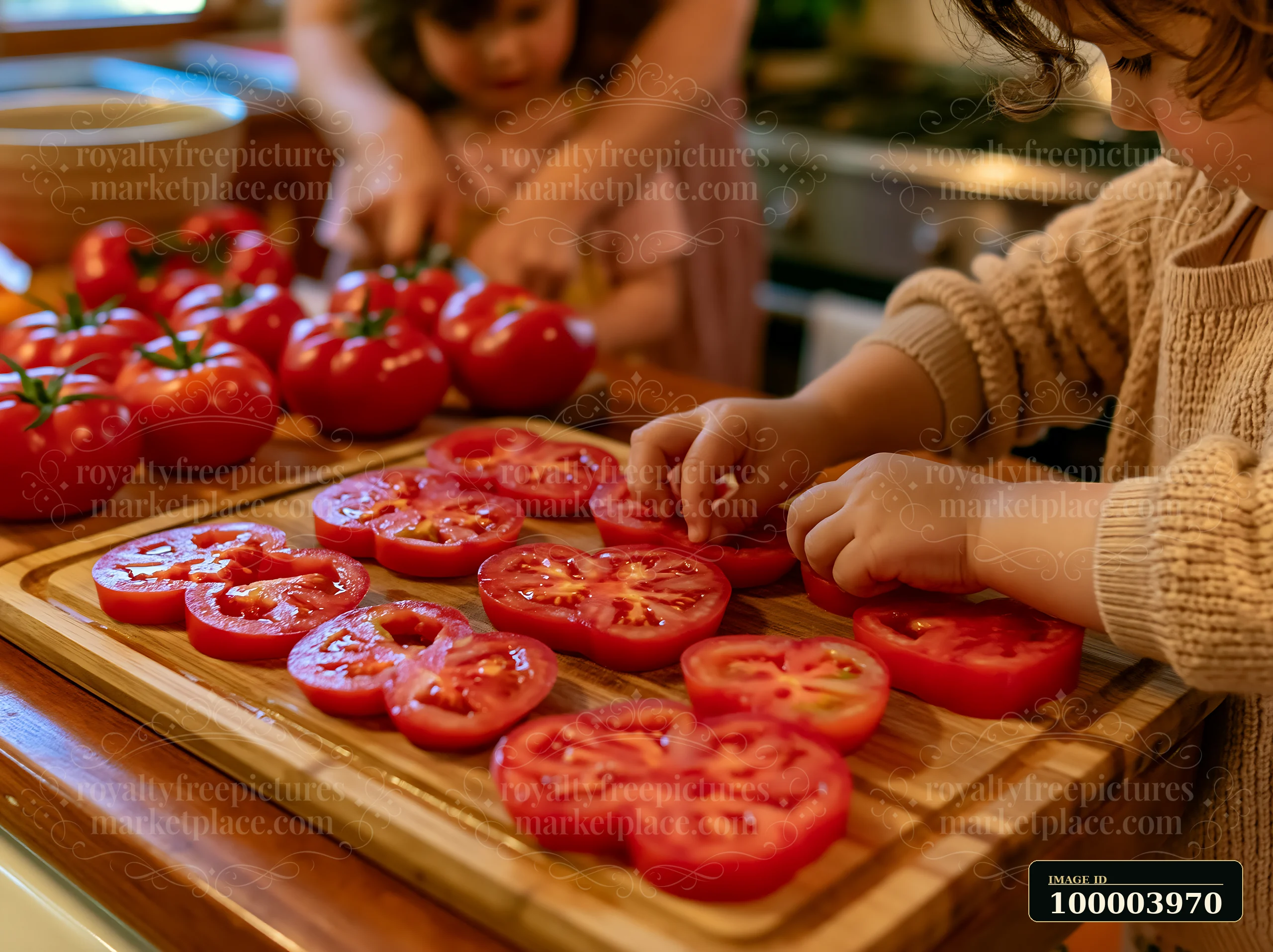 A child is slicing red tomatoes on a wooden cutting board in a kitchen.