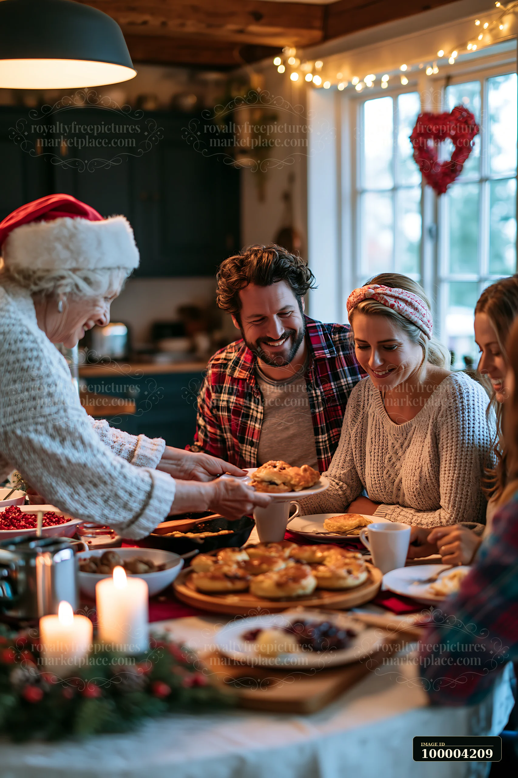 Family shares a festive breakfast around a decorated dining table on Christmas morning.