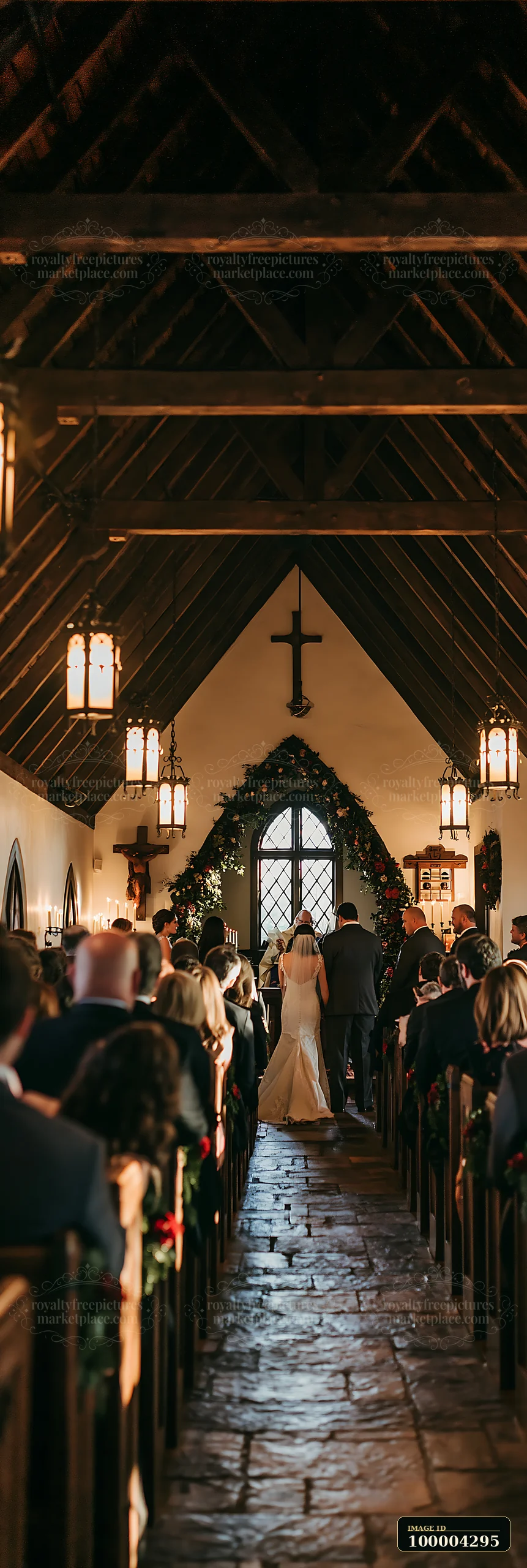 A couple stands at the altar during their wedding ceremony in a small chapel.
