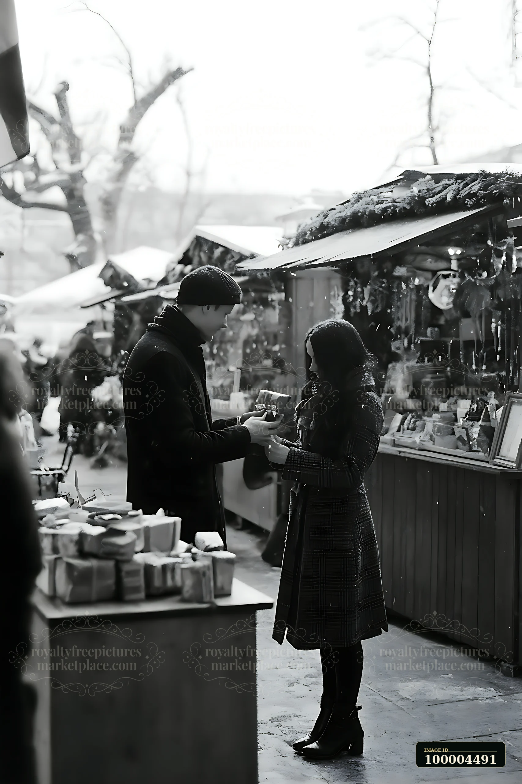 Two siblings stand at a market during winter, exchanging gifts with smiles.