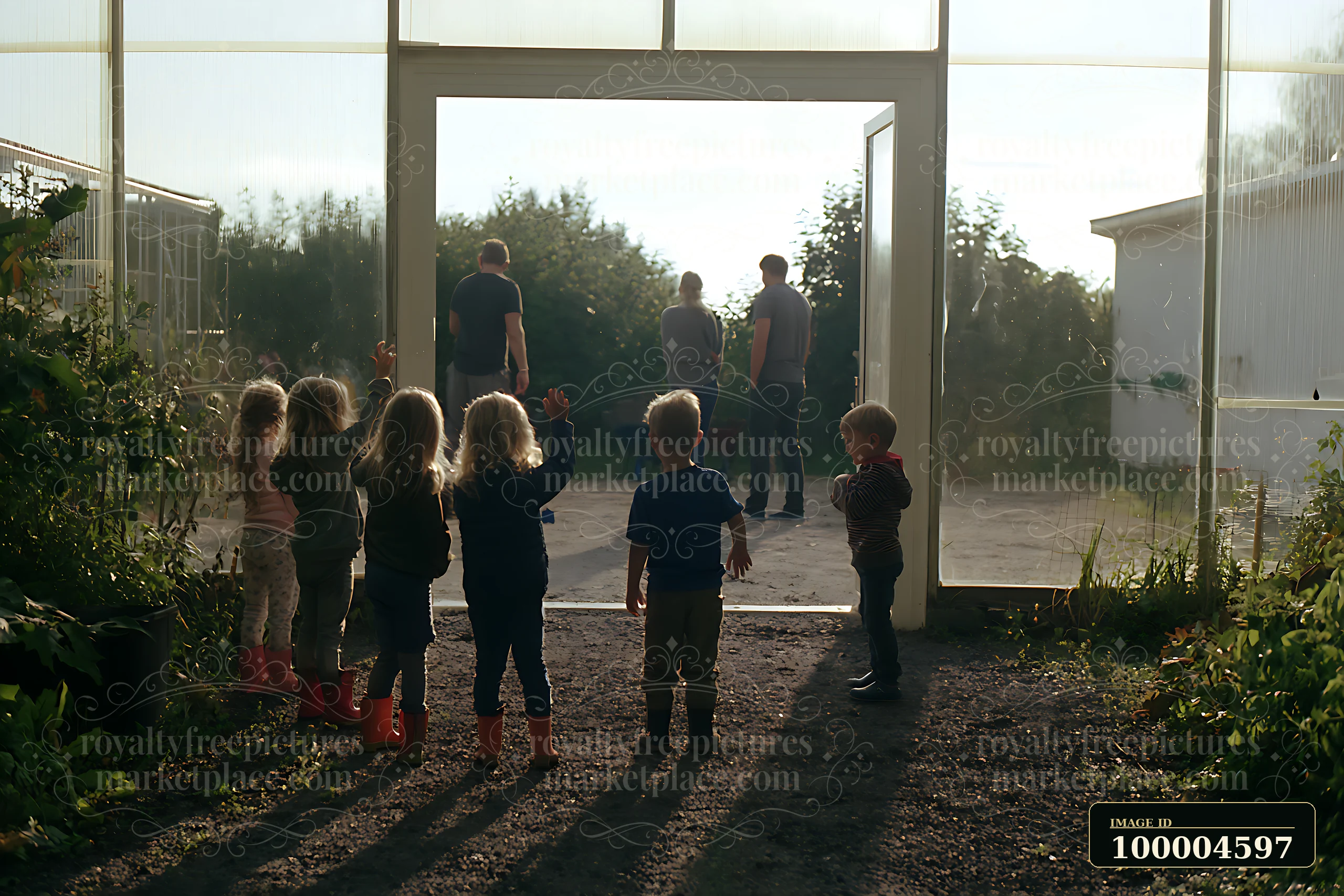 Blonde children wave toward two adults standing outside in a sunlit garden.