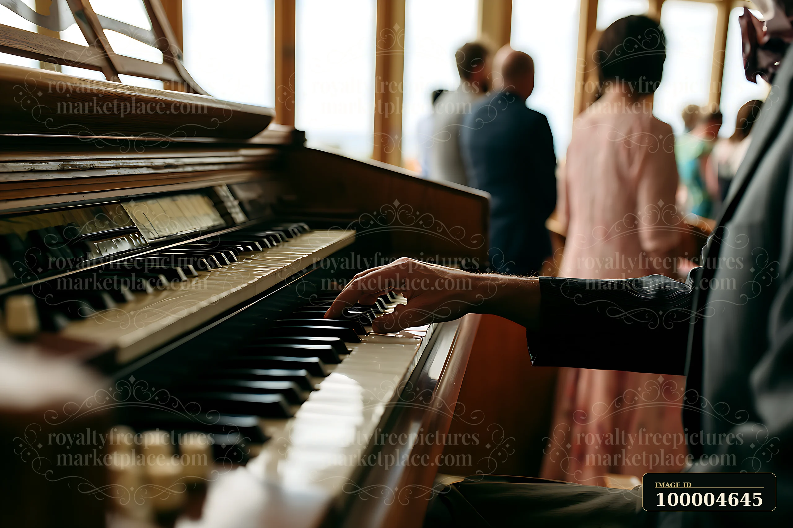An organist plays music during a wedding ceremony inside a venue.