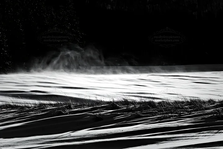 Snowy Rocky Mountain Park meadow with wind patterns - AI-generated stock image