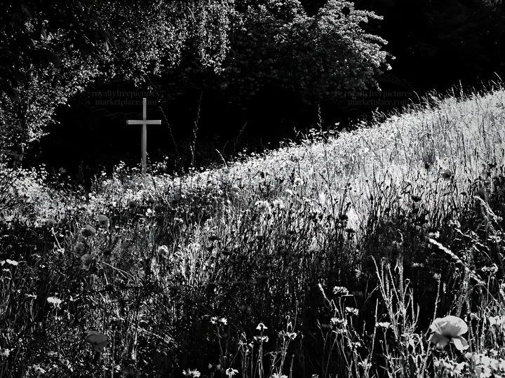 White Christian cross in a Christmas meadow - AI-generated stock image