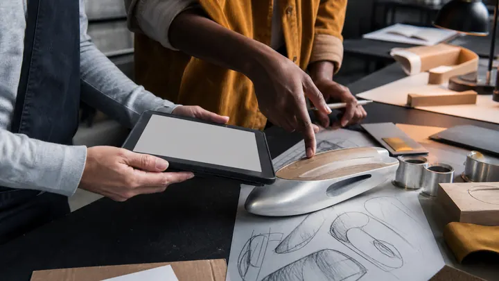 Designers Reviewing a New Prototype