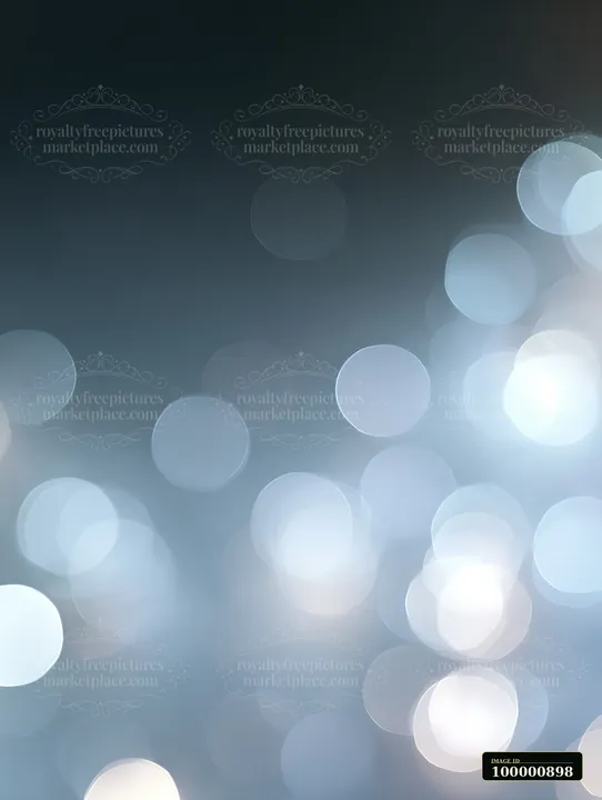 Soft bokeh lights create a blurred background with various circles of light.