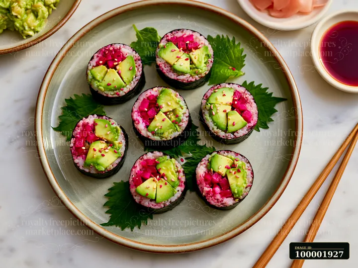 Sushi with shiso leaves is arranged on a plate with avocado and garnished with pickled ginger.