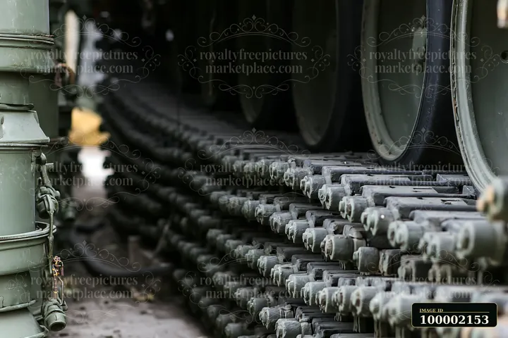 Panzer tank tracks close-up shows the arrangement and texture of the tracks and wheels.