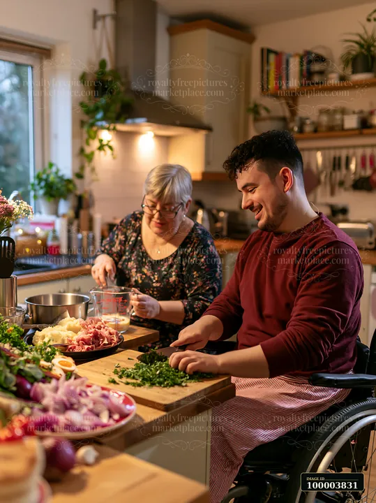 Two people prepare Christmas dinner together in a warmly lit kitchen with chopped herbs, vegetables, and cooking utensils.
