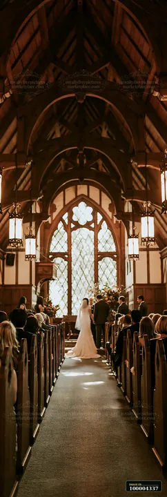 A couple exchanges vows during a marriage ceremony in a small chapel filled with guests.